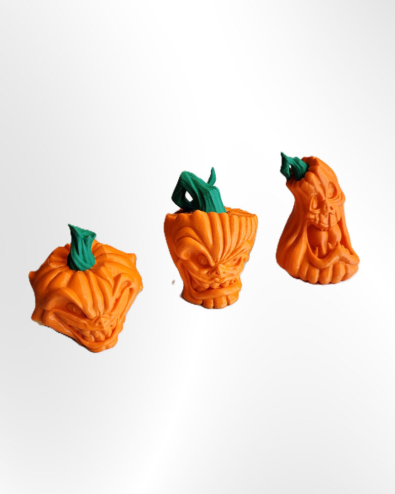 Spocīgo ķirbju figūru trio